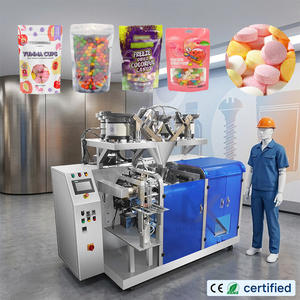 Machine d'emballage et de comptage automatique de bonbons compressés, de bonbons au lait et de menthes en sachets préformés Doypack à 4 plaques vibrantes - Product Image 1
