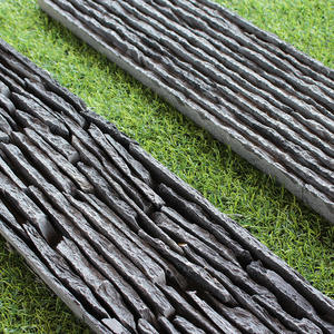 Paneles de piedra apilados naturales baratos en pizarra negra para decoración de pared de TV de fachada exterior de chimenea con acabado de superficie dividida - Product Image 4