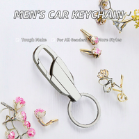 Porte-clés de voiture en métal noir simple Porte-clés porte-monnaie à la mode Petit cadeau pour hommes de l'activité publicitaire d'usine