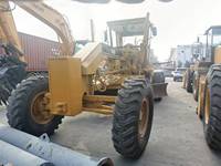Niveleuse Caterpillar 140G/140H importée du Japon avec ripper, moteur, boîte de vitesses et pompe – Occasion, 2295 heures de service