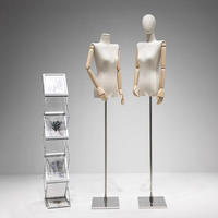 Mannequins féminins demi-corps avec base en métal et bras en bois pour vitrine de magasin de vêtements