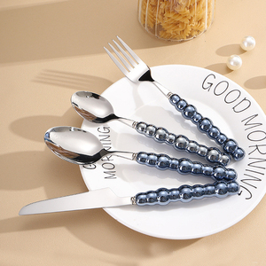 Juego de cuchillo y tenedor para carne occidental con mango de cerámica perlada, 4 cubiertos de acero inoxidable 304 para vajilla - Product Image 1