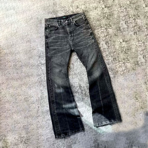 थोक मध्य कमर विंटेज धोया पुरुषों की बैगी सीधी शैली डेनिम जींस कैजुअल शीतकालीन पैंट, गैंडा विवरण के साथ - Product Image 1