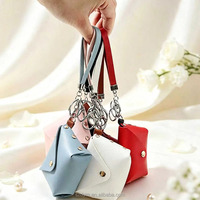 Mini porte-monnaie en PU avec porte-clés, pochette de rangement portable pour écouteurs, petit sac en cuir avec dragonne
