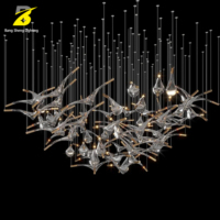 Grand Lustre LED en Cristal Cascade - Luminaire Ambiant Artisanal en Verre Transparent pour Villa de Luxe et Salle de Banquet