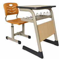 Ensemble bureau et chaise d'écolier moderne personnalisé, réglable, pour une seule personne, avec panier à livres et structure métallique