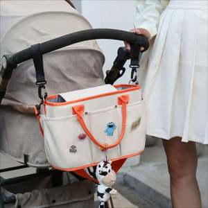 Bolsa Colgante Multifuncional para Coche de Bebé con Porta Biberones Aislante Impermeable - Product Image 1