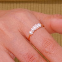Bague élégante en acier inoxydable plaqué or 18 carats avec perle d'eau douce, coupe princesse, tendance, luxe accessible, populaire à l'international