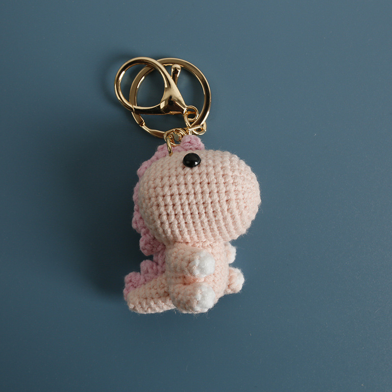 Pequeño dinosaurio rosa