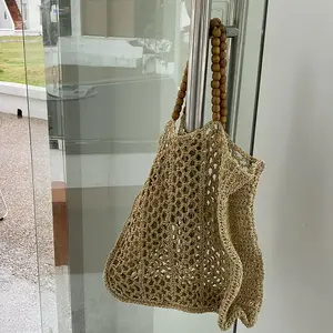 فيتنام INS أنيقة حيرة اليدوية ورقة حقيبة يد من القشّ الصيف شاطئ الجوف خارج حقيبة يد مع الخشب حبة مقبض