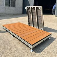 Système de terrasse modulaire en WPC co-extrudé pour l'extérieur, assemblage direct usine, idéal pour les jardins, pelouses, villas, parcs et projets paysagers