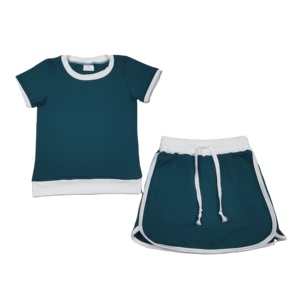 Conjunto de Ropa de 2 Piezas para Niñas Pequeñas, Camiseta de Algodón Informal de Color Sólido, Falda y Pantalones Cortos Forrados y Transpirables, Ropa para Hermanas - Product Image 1