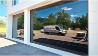 Porte de garage électrique de luxe en verre pour mur rideau, design transparent, pré-assemblée, monobloc, facile à installer
