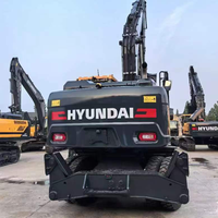 Excavatrice sur pneus Hyundai R210W-9 d'occasion 100% coréenne, 21 tonnes, avec moteur Cummins, pompe et PLC, modèle 2023, équipement pour travaux de terrassement