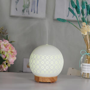 เครื่องกระจายกลิ่นหอมเซรามิคทรงกลม 0.5 ลิตร โคมไฟรูปพระจันทร์ พร้อมไฟ 7 สี เครื่องเผาน้ำมันหอมระเหยสำหรับบ้าน ขนาดพื้นที่น้อยกว่า 10 ตร.ม. - Product Image 2
