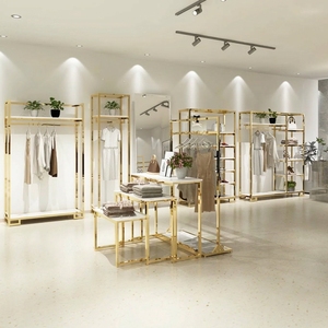 Étagère de présentation de vêtements en acier inoxydable moderne, multifonctionnelle, robuste et de luxe léger, pour boutiques et magasins de détail haut de gamme - Product Image 3