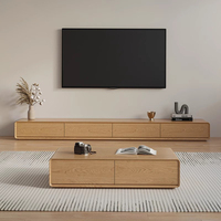 Console TV et table basse tout-en-un, unité fine à poser au sol pour les maisons modernes et compactes, style minimaliste et rangement intelligent