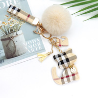 Porte-clés à pompon en cuir personnalisé, nouveau style, porte-clés de luxe de styliste