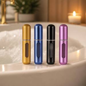 Atomiseur de parfum portable avec fenêtre de visualisation en or, bleu, noir et violet pour présentation sur coiffeuse - Product Image 2
