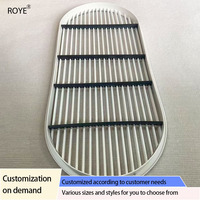 Sortie d'air centralisée pour climatisation en plastique ABS durable, en forme de capsule allongée, avec grille à lamelles pré-encadrées en arc aux deux extrémités