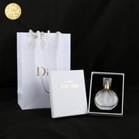 Boîte cadeau de luxe pour parfum avec couvercle et base en carton rigide, logo personnalisé en feuille métallique, texture, boîte de parfum avec découpe et éponge floquée noire