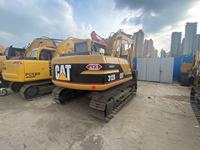 Excavatrice sur chenilles multi-usages Cat 312B – Machines de construction