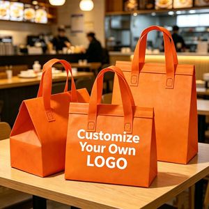 Sac isotherme non tissé orange imprimé avec logo personnalisé et doublure en feuille d'aluminium pour la livraison de repas - Product Image 1