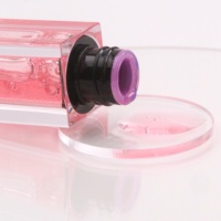 Gloss à l'huile pour les lèvres hydratant OEM de marque privée 10 couleurs fruit personnalisé mignon vegan pastèque brillant à lèvres plus dodu teinte à lèvres bas quantité minimale de commande