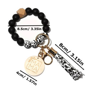 Siliconen kralen armband sleutelhanger voor vrouwen, schattig boho kwastje auto polsbandje sleutelring met MAMA ronde houten hanger - Product Image 2