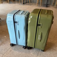 Valise rigide de luxe unisexe classique en PC, design concave-convexe, roues multidirectionnelles universelles, grande capacité, silencieuse, exportée du Royaume-Uni
