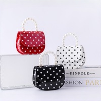 Nouveau sac d'été pour enfants en PU imperméable avec nœud papillon, mini porte-monnaie tendance, sac mignon de style occidental