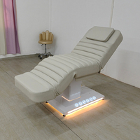 Mesa de masaje de cuero con Base blanca moderna Cama de spa 3 motores Spa eléctrico Cosmético Cama facial con luces LED