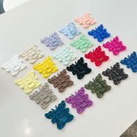Support pliable multifonctionnel en silicone à ventouse papillon pour iPhone 17 Pro Max – Accessoire portable pour téléphone