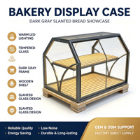 Vitrine à pain hexagonale de luxe en métal noir avec cadre incliné, vitrine de boulangerie haut de gamme multifonctionnelle avec éclairage LED