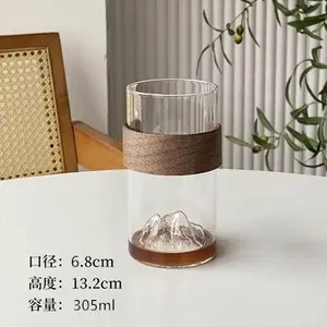 Taza de café de vidrio transparente Juego de aislamiento de bambú y madera taza de montaña de vidrio