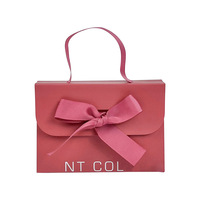 Sac cadeau haut de gamme en papier couché à fond carré pour cosmétiques, bijoux, petits sacs à main, banquets de pleine lune, mariages, personnalisable