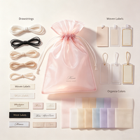 Pochette à bijoux en organza de luxe avec logo personnalisé, sac cadeau en maille haute densité avec cordon de serrage pour emballage de cosmétiques en boutique
