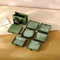 Boîte à bijoux de type tiroir vert terre avec pochette assortie pour l'emballage de bijoux fins