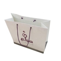 Sac fourre-tout en papier kraft personnalisé avec logo imprimé, idéal pour l'emballage de vêtements, chaussures et cadeaux, vente en gros, avec poignée