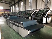 Machine à laminer semi-automatique pour boîtes en carton ondulé