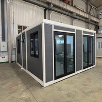 Maison préfabriquée pliable de 20 pieds à toit plat, conteneur extensible, bureau portable, dortoir, prête à être expédiée