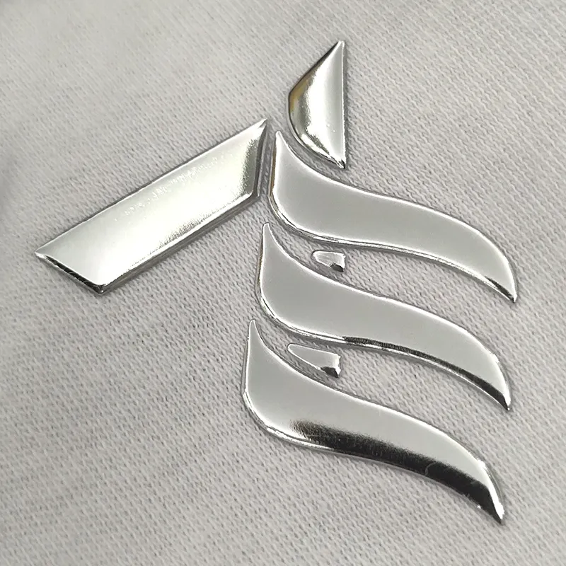 Nom de marque personnalisé étiquette de transfert de chaleur hologramme métal or argent en relief logo insigne fer sur 3D Tpu patchs pour vêtements chapeaux