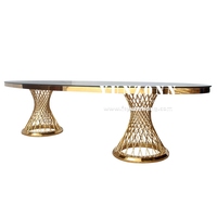 Ensemble table et chaises ovales de luxe dorées en acier inoxydable pour fêtes de mariage et mobilier d'hôtel