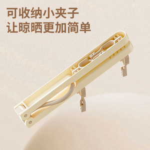 Folding <b>clothes</b> hanger, travel-grade, residue-free <b>clothes</b> <b>rack</b> with clips, portable for travel, business trips, and hotels. A m - Product Image 4
