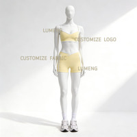 Vêtements de sport pour femmes : Ensemble de yoga avec soutien-gorge dos ouvert et short taille en V, motif cœur et blocs de couleur