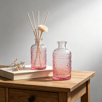 Bouteilles de diffuseur à roseaux en verre rose luxueuses de 150 ml, vides, avec bouchon en liège et sérigraphie, pour la vente en gros de parfums d'ambiance