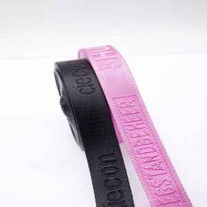 สายรัดผ้าทอแบบแบนคุณภาพสูง ผลิตตามสั่ง เป็นมิตรกับสิ่งแวดล้อม ขนาด 50 มม. ผลิตจากโพลีเอสเตอร์และไนลอนรีไซเคิล ลายนูนแบบดิบโซส์ พร้อมปักลาย - Product Image 1