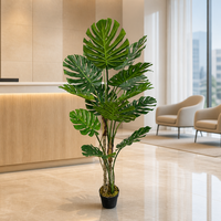 Plante artificielle Monstera exotique haute, ornement de verdure artificielle pour la décoration intérieure et la mise en scène d'événements