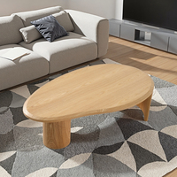 Table basse scandinave moderne en bois, table de salon nordique avec design en forme de galets