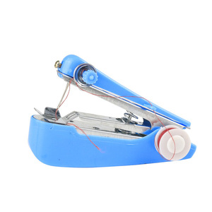 Mini Manual <b>Sewing</b> <b>Machine</b> Portable Pocket Sized For Home Use Plastic Body With Red Thread Spool - Product Image 1